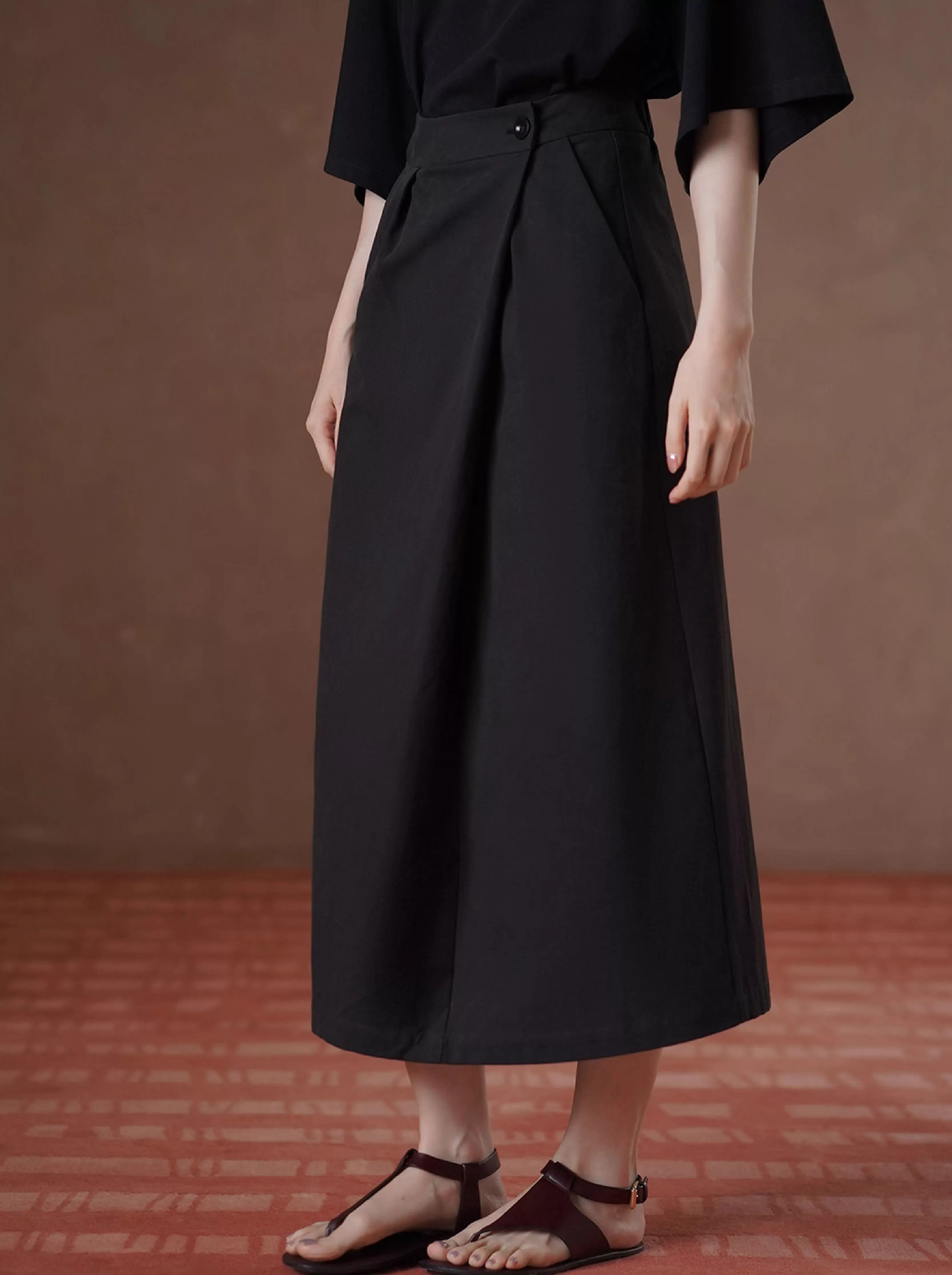 不出錯通勤一粒扣不對稱斜門襟顯瘦倒褶寬鬆直筒半身裙