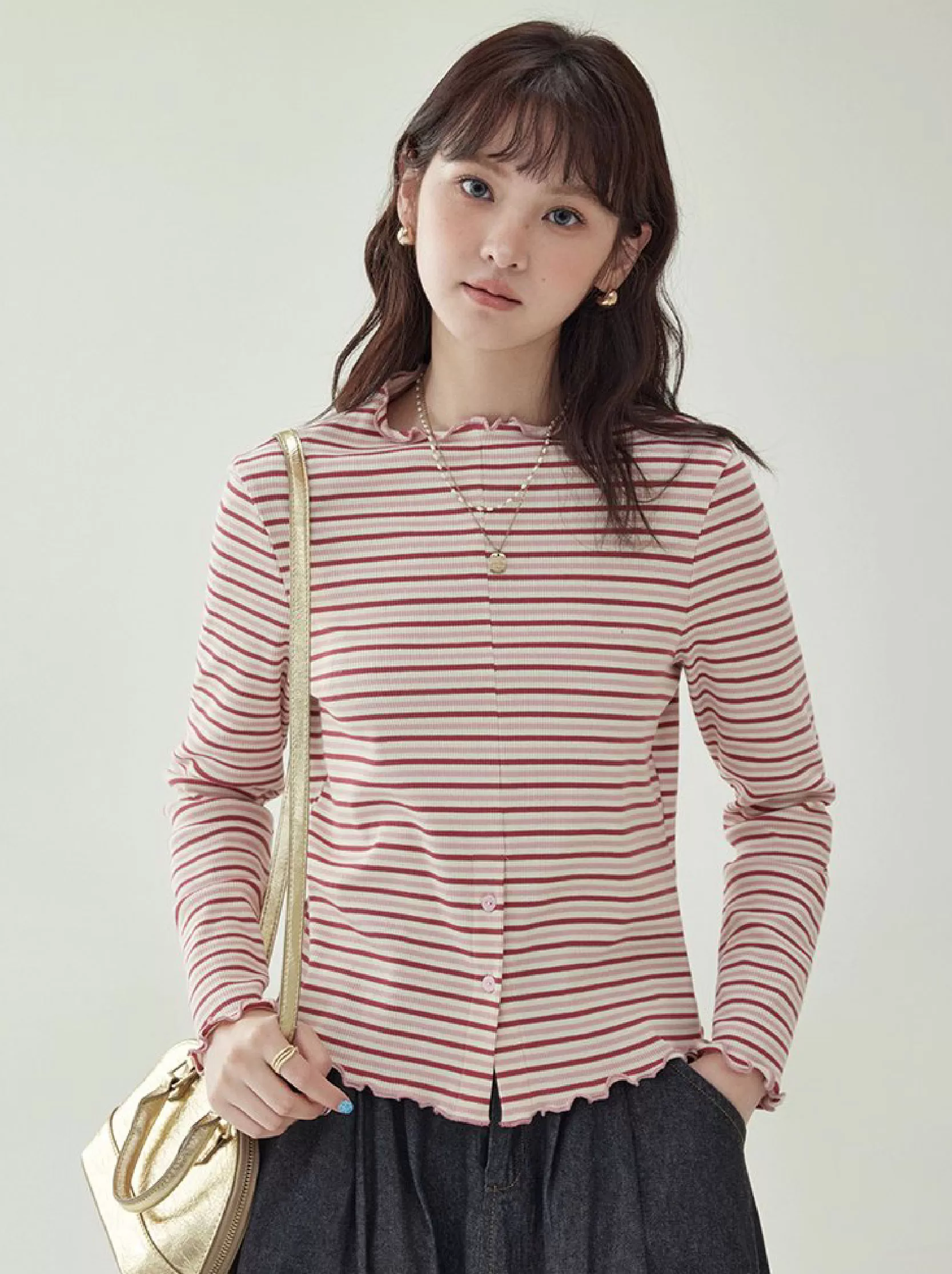 下擺扣條紋兩穿內搭T恤女秋新款花邊長袖上衣