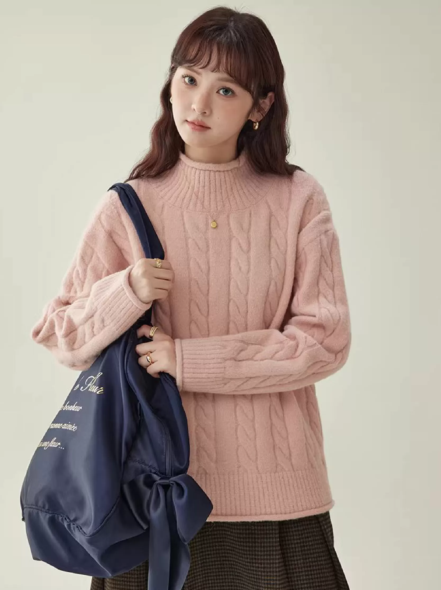 減齡粉紅高領麻花毛衣女25冬季新款捲邊長袖上衣