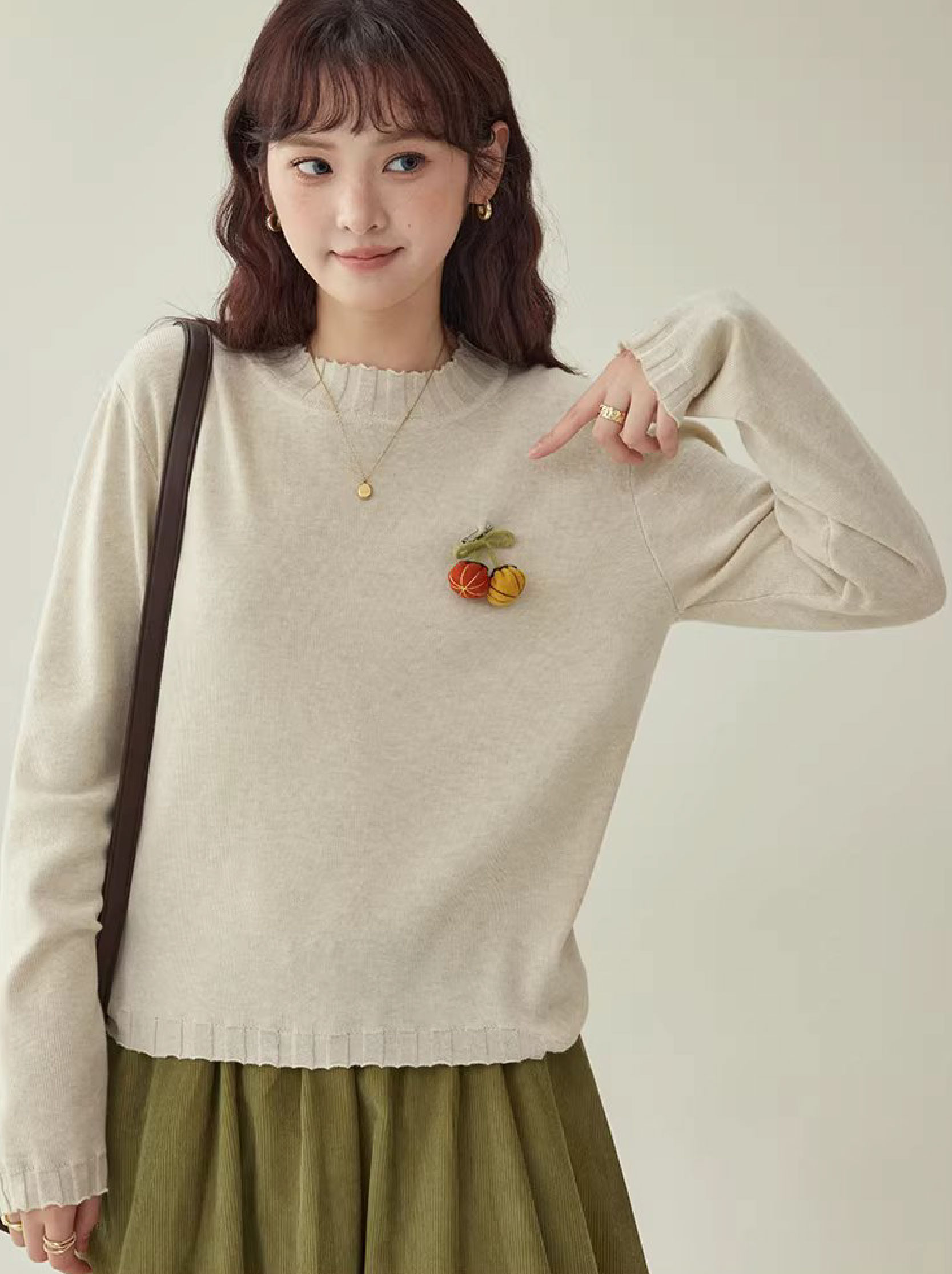 可愛胸針羊毛混紡針織衫女冬季新款慵懶長袖上衣