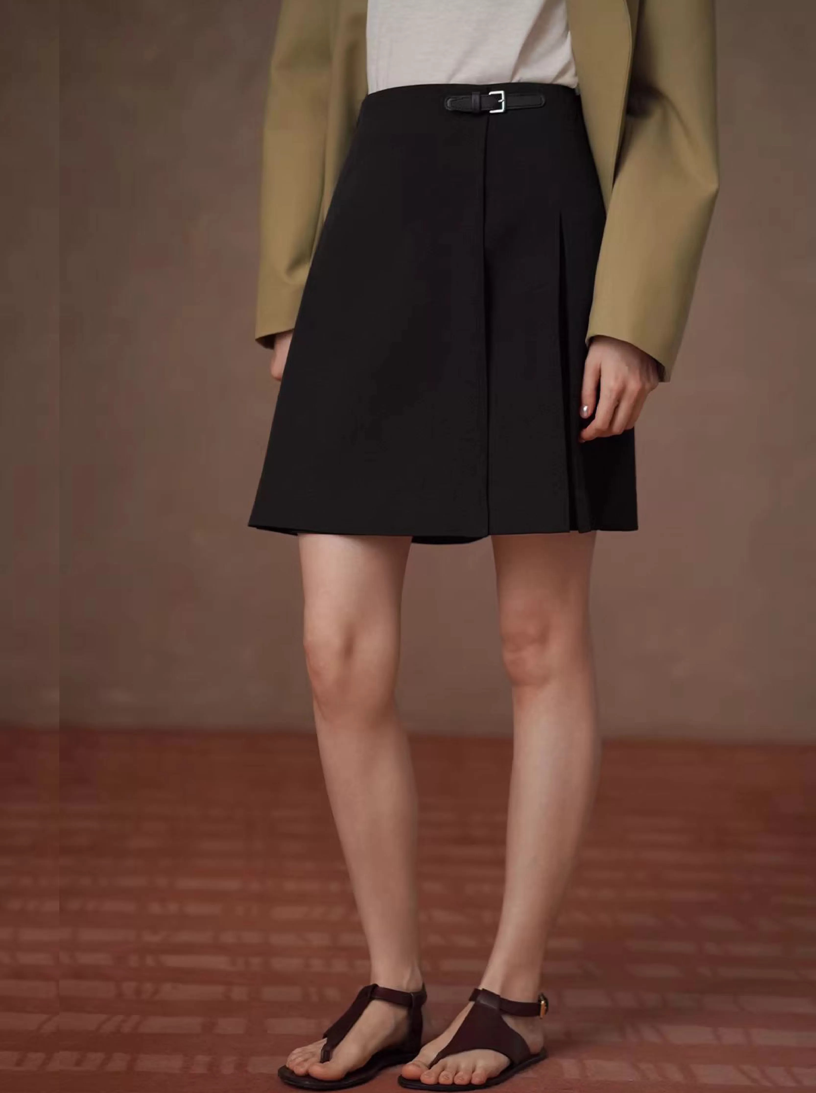 不對稱工字褶設計A字微傘版型皮袢高腰顯瘦學院半身裙女