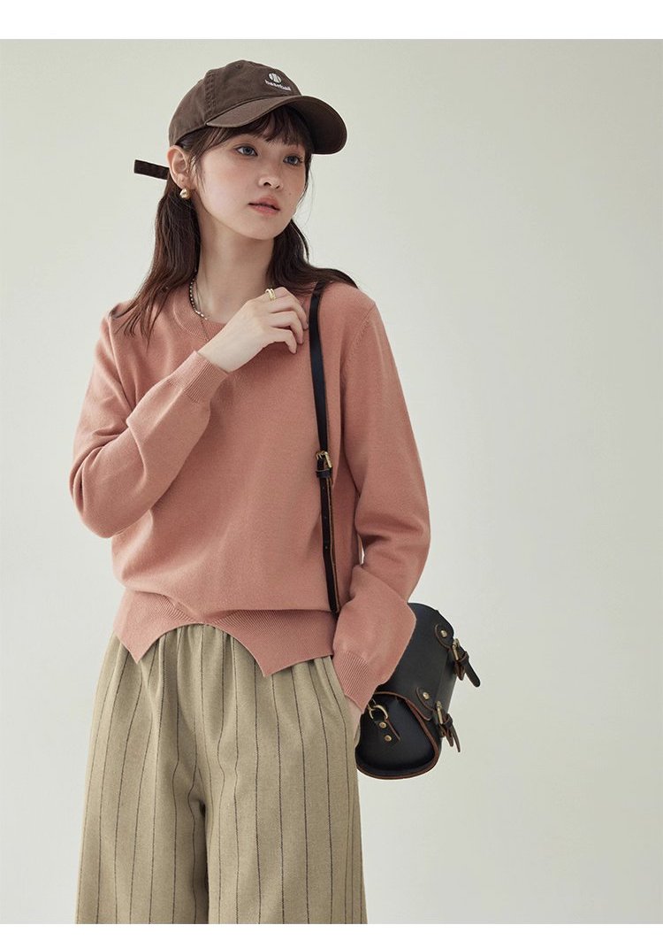簡約純色下擺開叉針織衫女秋季新款圓領長袖上衣