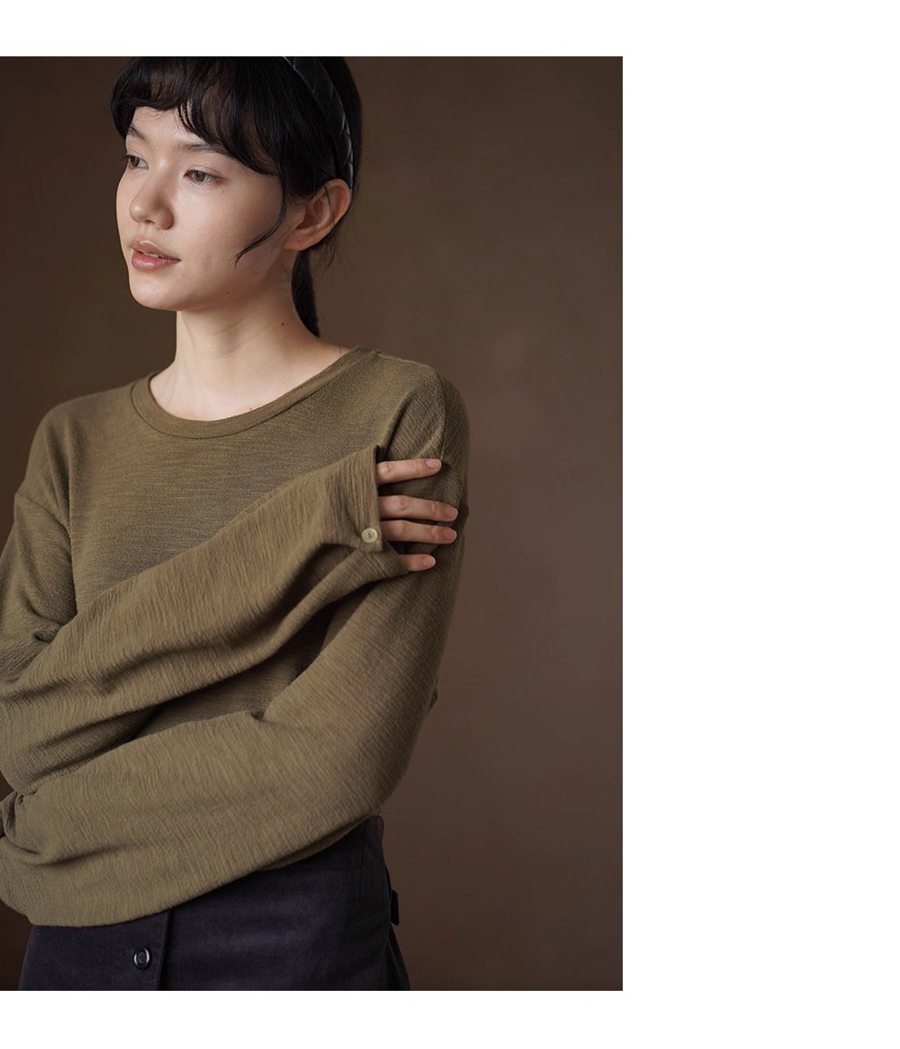 飄蕩蘆葦寬鬆上衣落肩顯瘦肌理圓領下擺開叉長袖內搭T恤