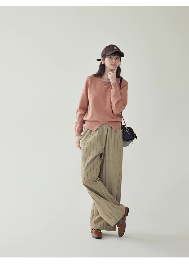 簡約純色下擺開叉針織衫女秋季新款圓領長袖上衣