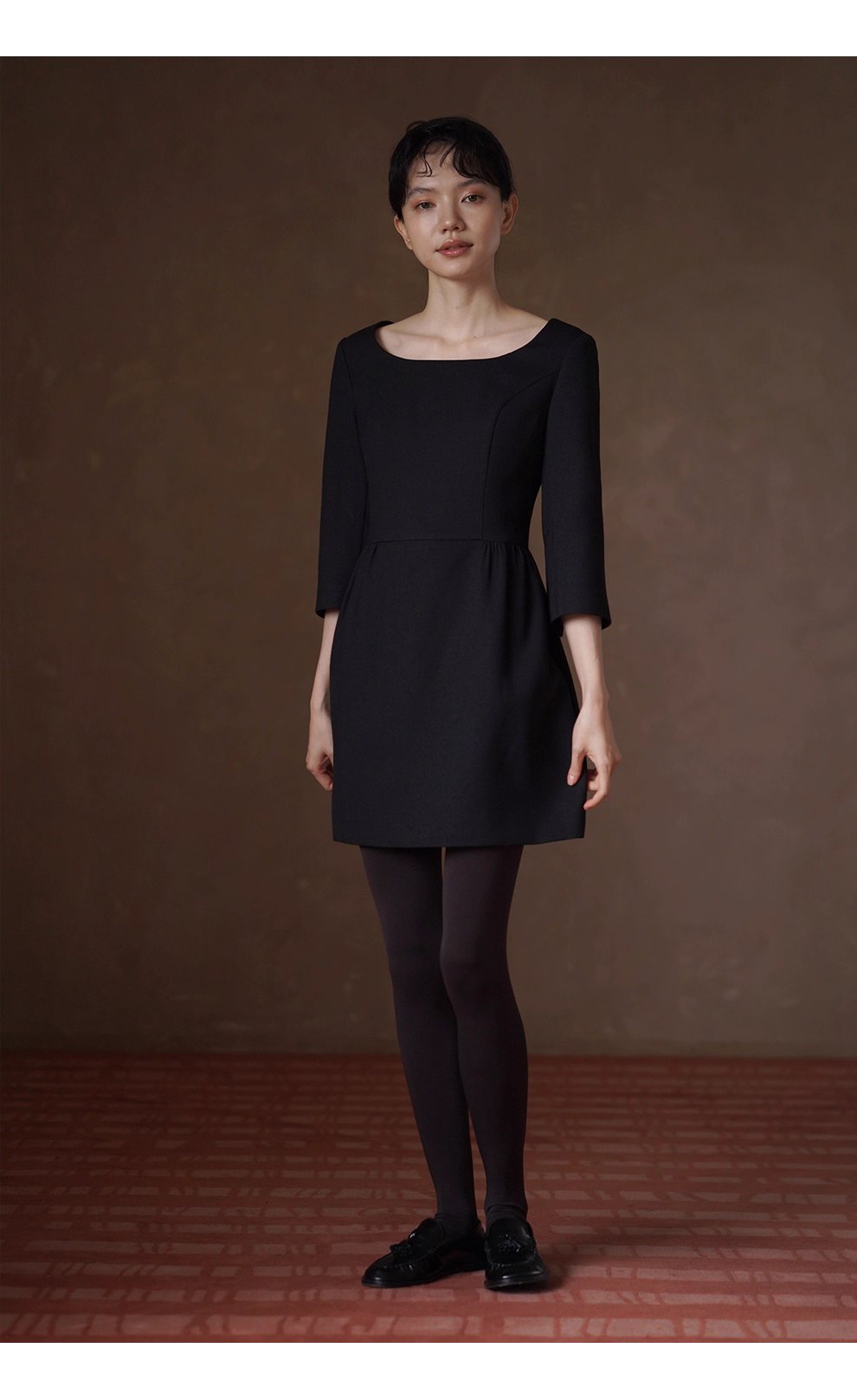 優雅七分袖收腰洋裝微蓬高腰分割顯瘦花苞裙擺小黑裙