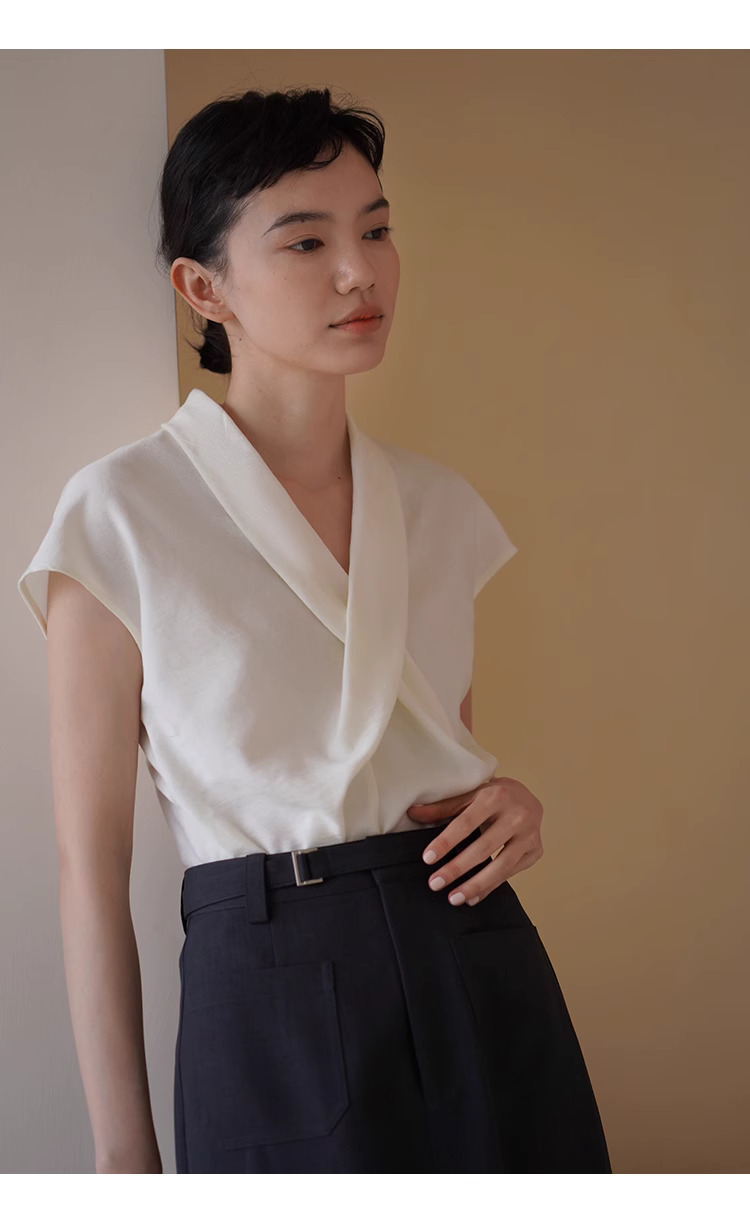 精緻姊姊交叉V領設計感優雅扭結收腰氣質垂順顯瘦上衣女