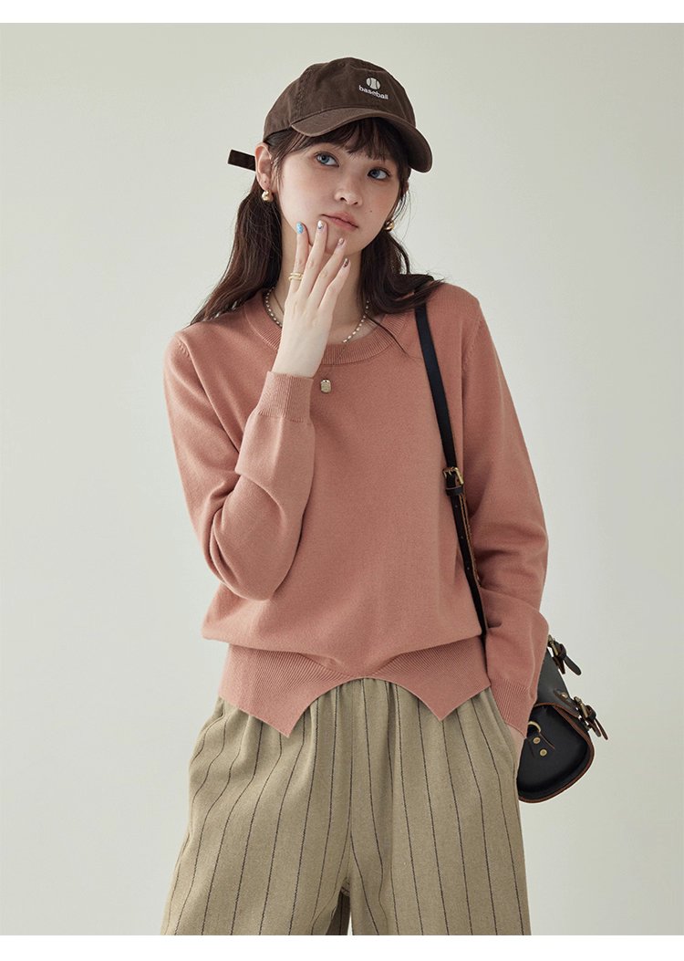 簡約純色下擺開叉針織衫女秋季新款圓領長袖上衣