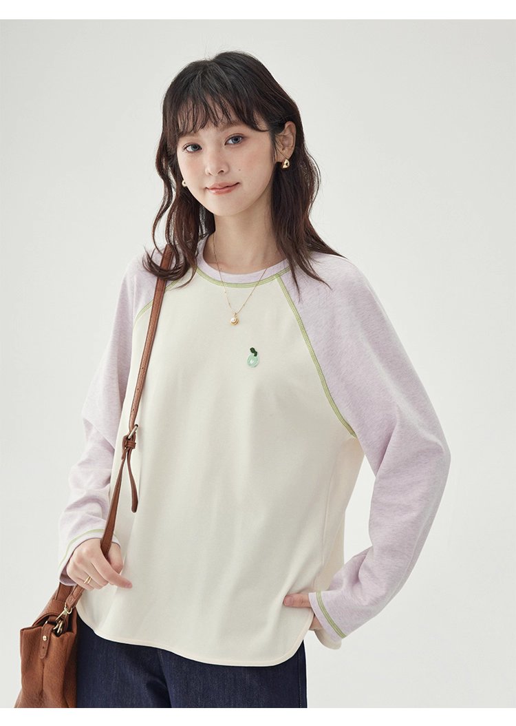 撞色插肩長袖側開叉T恤女秋季新款減齡刺繡上衣