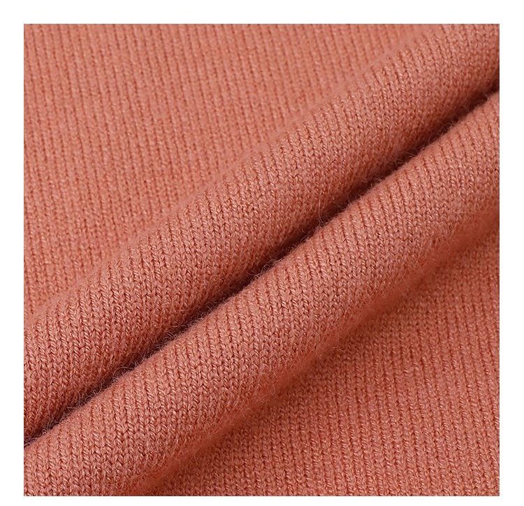 簡約純色下擺開叉針織衫女秋季新款圓領長袖上衣