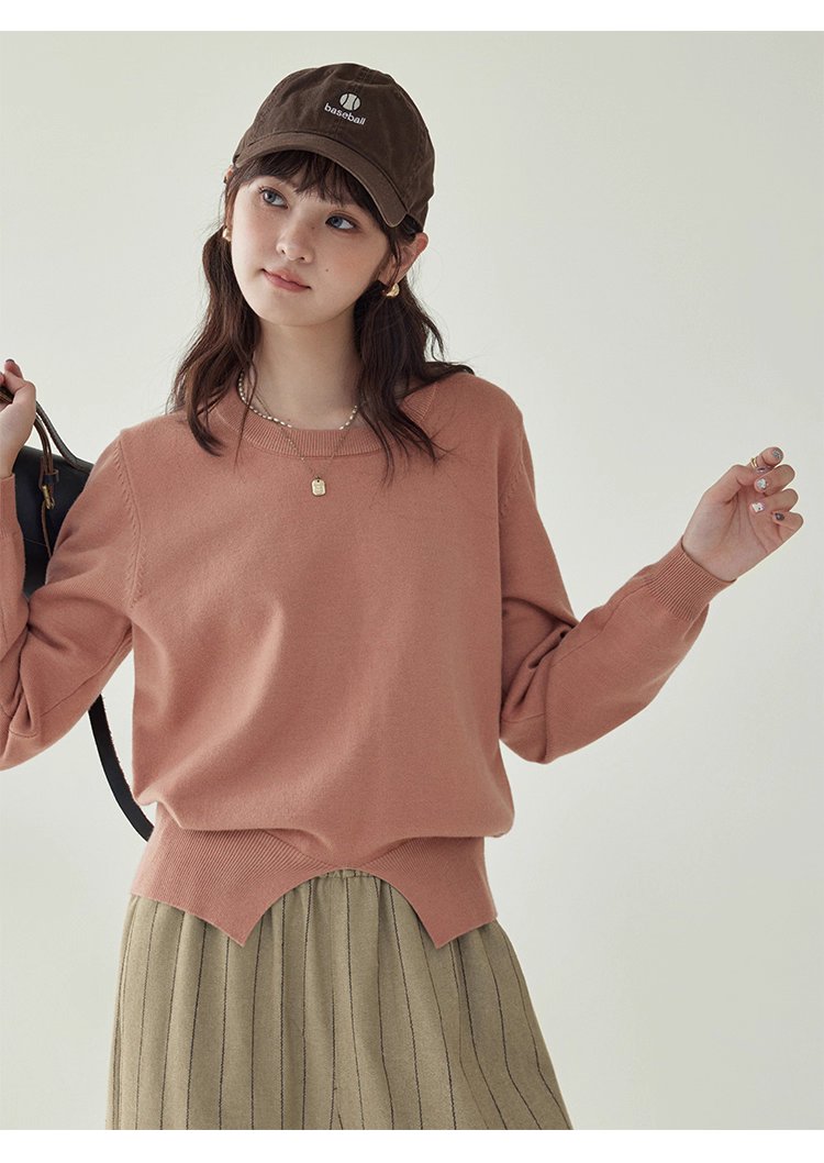 簡約純色下擺開叉針織衫女秋季新款圓領長袖上衣