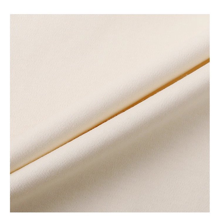 撞色插肩長袖側開叉T恤女秋季新款減齡刺繡上衣