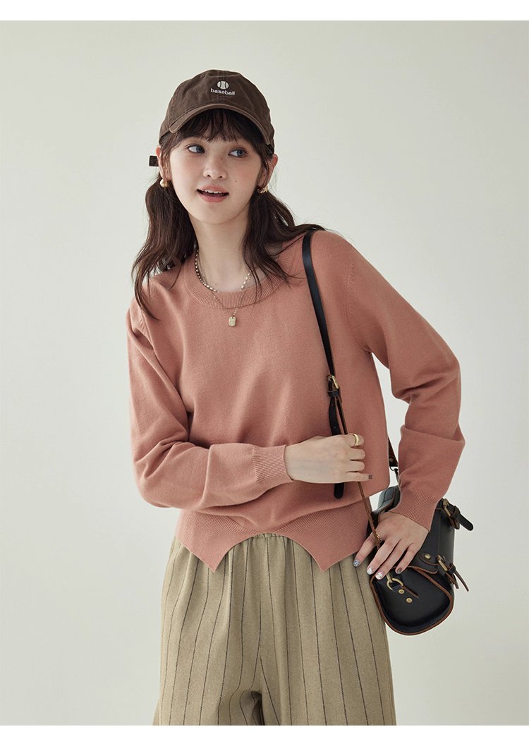 簡約純色下擺開叉針織衫女秋季新款圓領長袖上衣