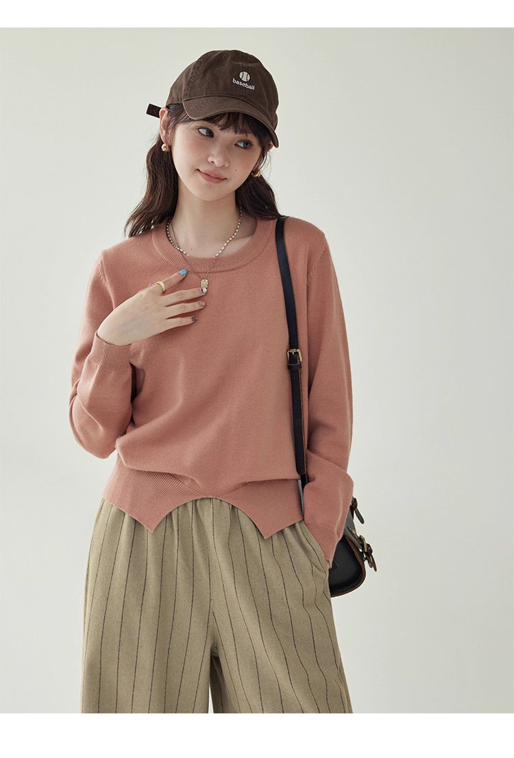 簡約純色下擺開叉針織衫女秋季新款圓領長袖上衣