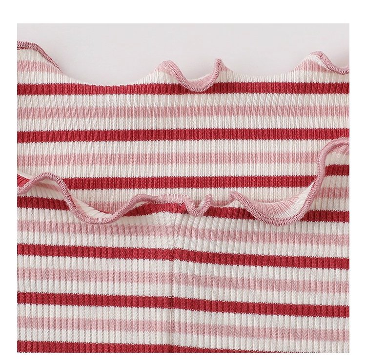 下擺扣條紋兩穿內搭T恤女秋新款花邊長袖上衣