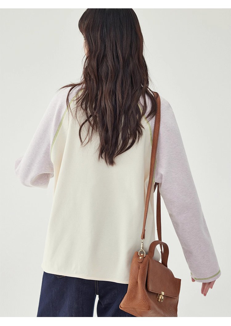 撞色插肩長袖側開叉T恤女秋季新款減齡刺繡上衣