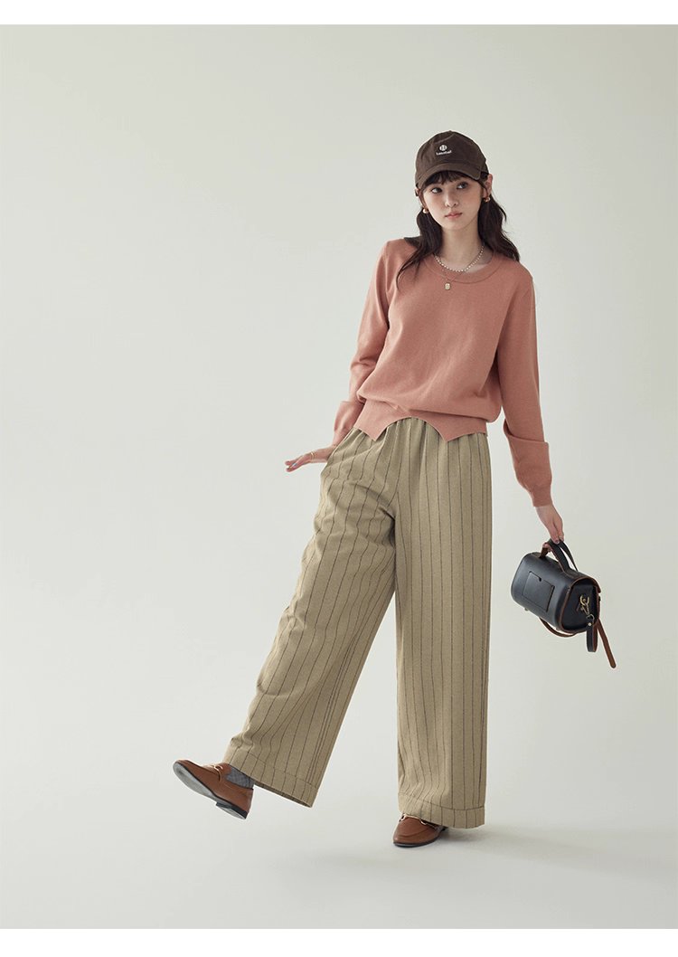 簡約純色下擺開叉針織衫女秋季新款圓領長袖上衣