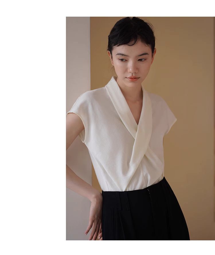 精緻姊姊交叉V領設計感優雅扭結收腰氣質垂順顯瘦上衣女
