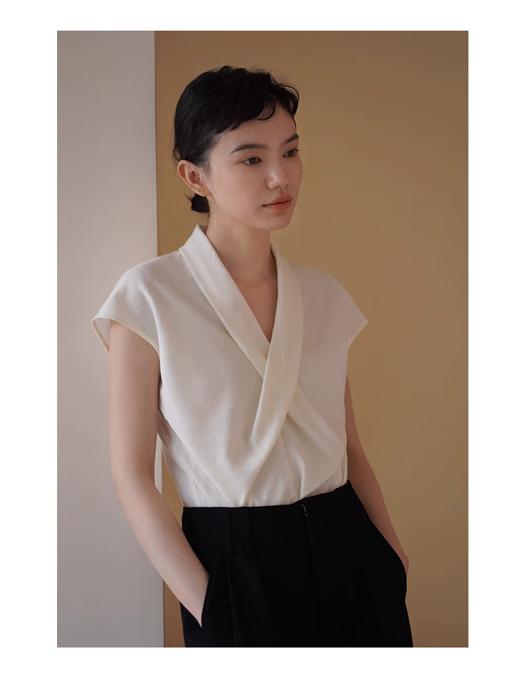精緻姊姊交叉V領設計感優雅扭結收腰氣質垂順顯瘦上衣女