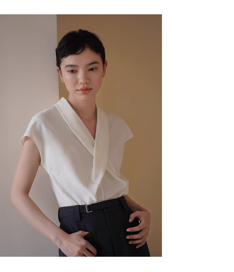 精緻姊姊交叉V領設計感優雅扭結收腰氣質垂順顯瘦上衣女