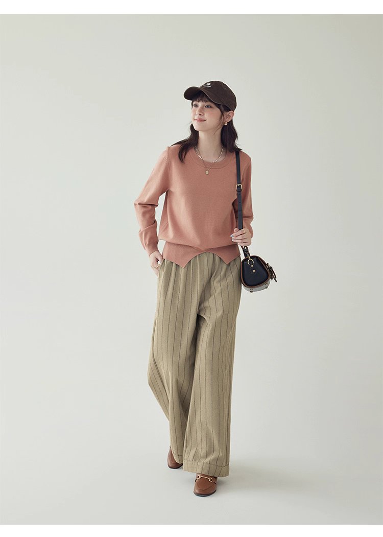 簡約純色下擺開叉針織衫女秋季新款圓領長袖上衣