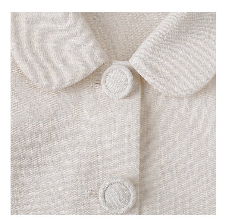 小香風純色單排扣短外套女秋新款波浪擺長袖上衣