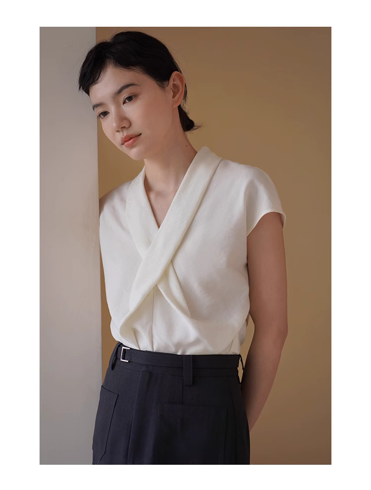 精緻姊姊交叉V領設計感優雅扭結收腰氣質垂順顯瘦上衣女