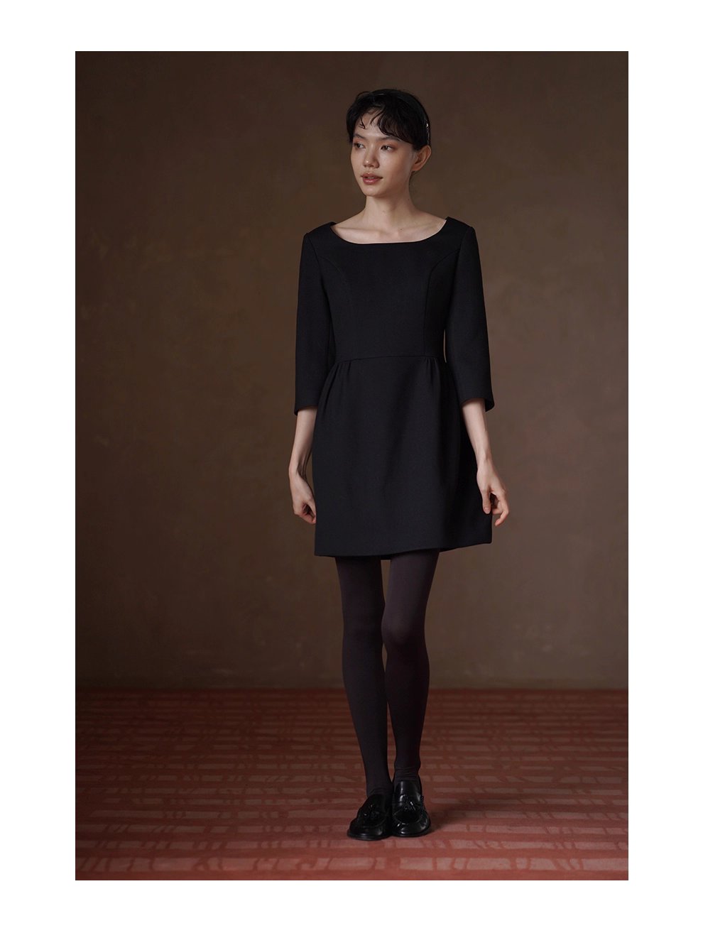 優雅七分袖收腰洋裝微蓬高腰分割顯瘦花苞裙擺小黑裙
