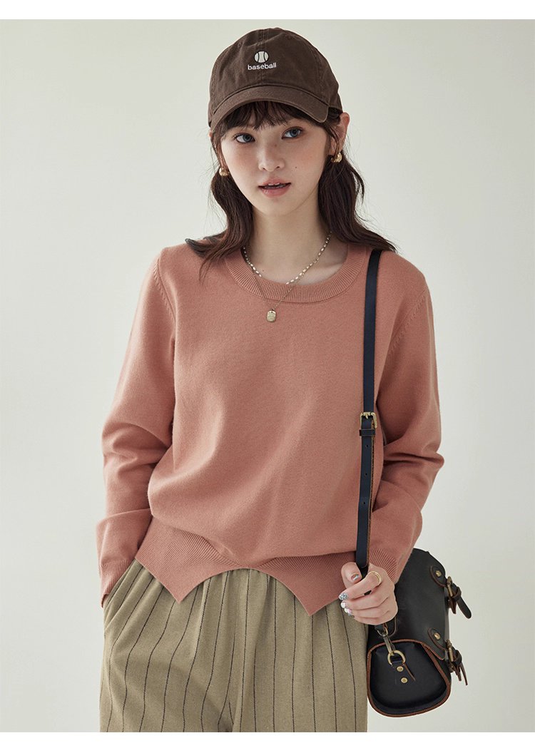 簡約純色下擺開叉針織衫女秋季新款圓領長袖上衣