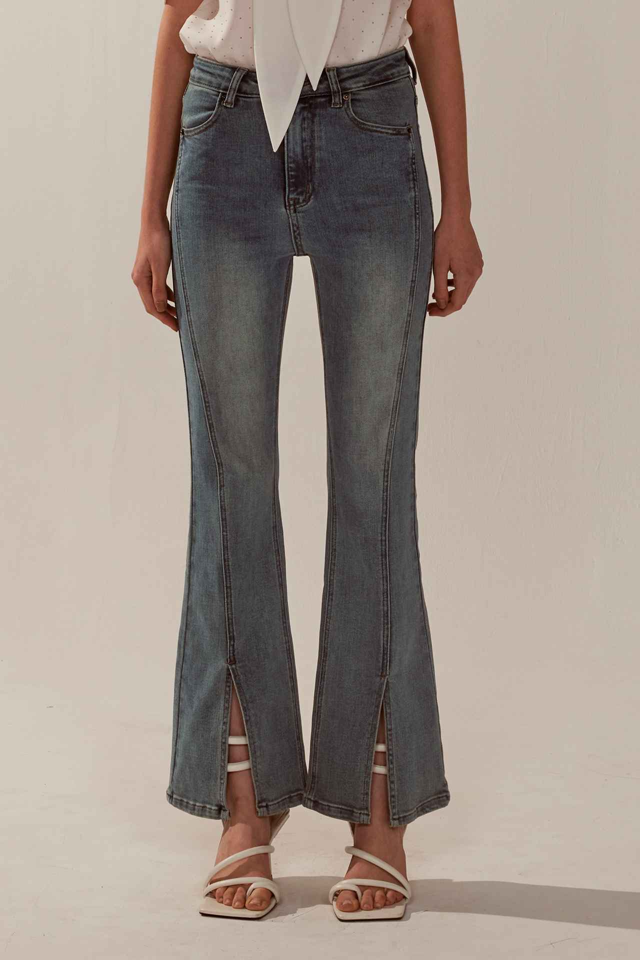 三葉草扣下擺開叉牛仔褲