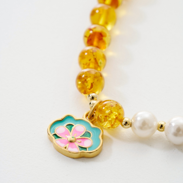 花珀珍珠蓮花手珠,溫潤琥珀✧蓮花寓意,U60660004,花珀珍珠蓮花手珠,花珀色澤,蓮花寓意